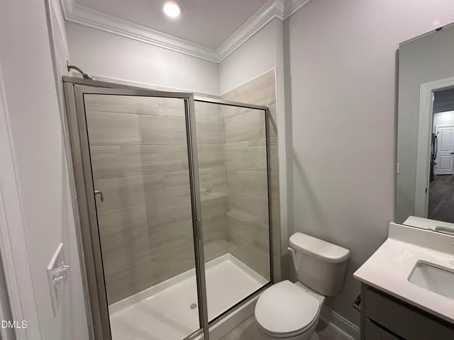 a living room with fireplace furniture and a flat screen tv