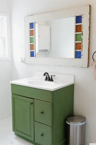 a bathroom with a sink and a toilet