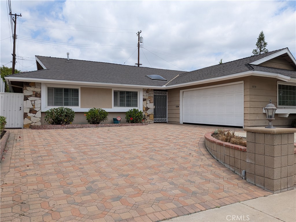 15739 Lone Ridge Place La Mirada, CA 90638 - Photo 1 of 39 a front view of house with yard