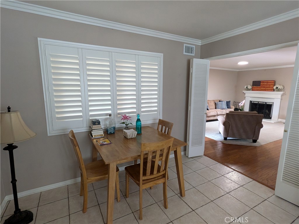 15739 Lone Ridge Place La Mirada, CA 90638 - Photo 11 of 39 a view of a dining room with furniture and a window