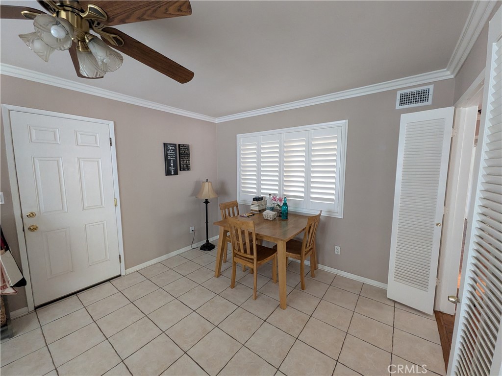 15739 Lone Ridge Place La Mirada, CA 90638 - Photo 12 of 39 a dining room with furniture and window