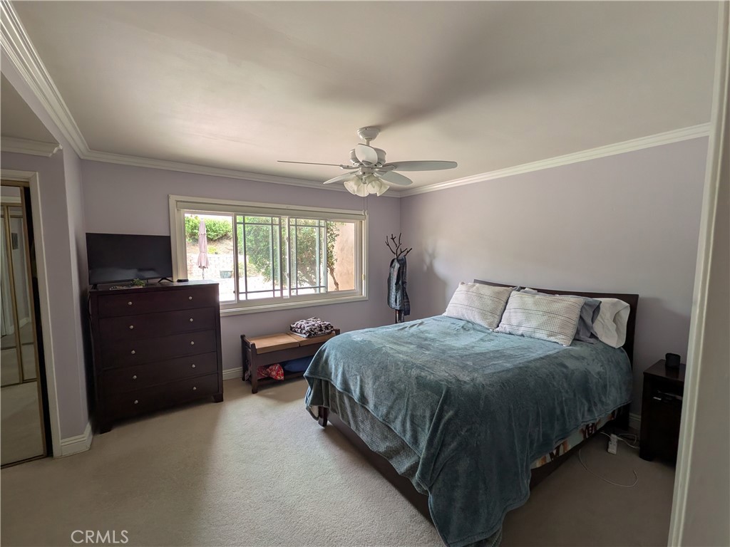 15739 Lone Ridge Place La Mirada, CA 90638 - Photo 22 of 39 a bedroom with a bed and a window