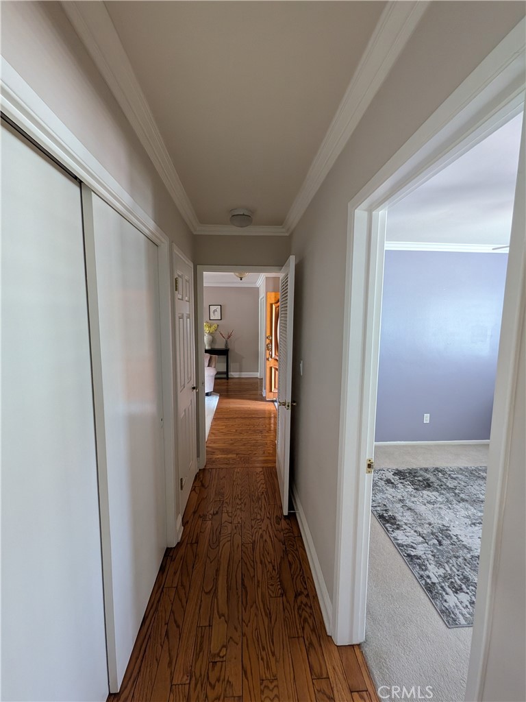 15739 Lone Ridge Place La Mirada, CA 90638 - Photo 26 of 39 a view of hallway with wooden floor
