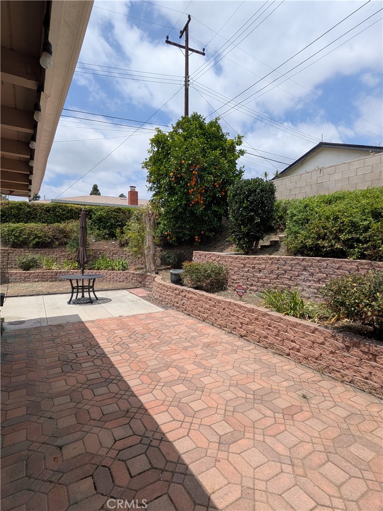 15739 Lone Ridge Place La Mirada, CA 90638 - Photo 32 of 39 a house with a bench in front of it