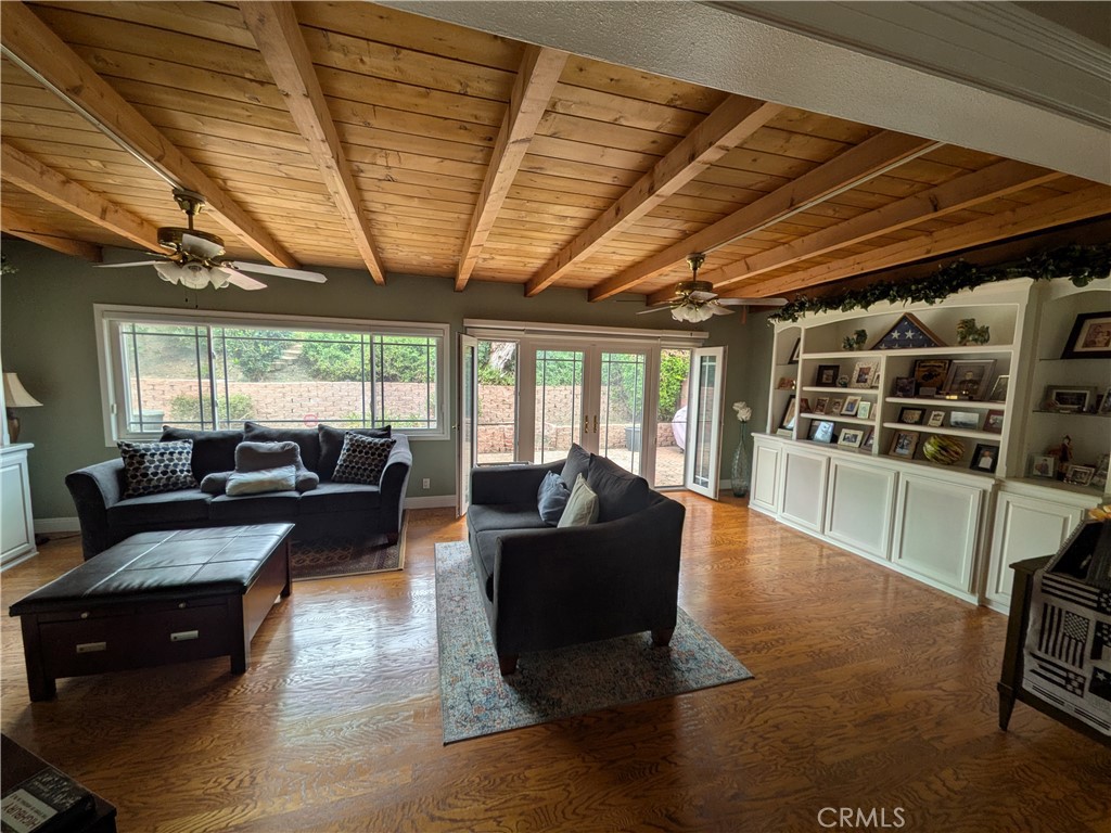 15739 Lone Ridge Place La Mirada, CA 90638 - Photo 7 of 39 a living room with furniture and a large window