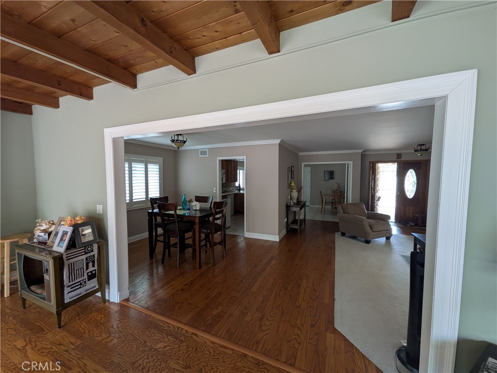 15739 Lone Ridge Place La Mirada, CA 90638 - Photo 8 of 39 a view of a dining room with furniture window and wooden floor