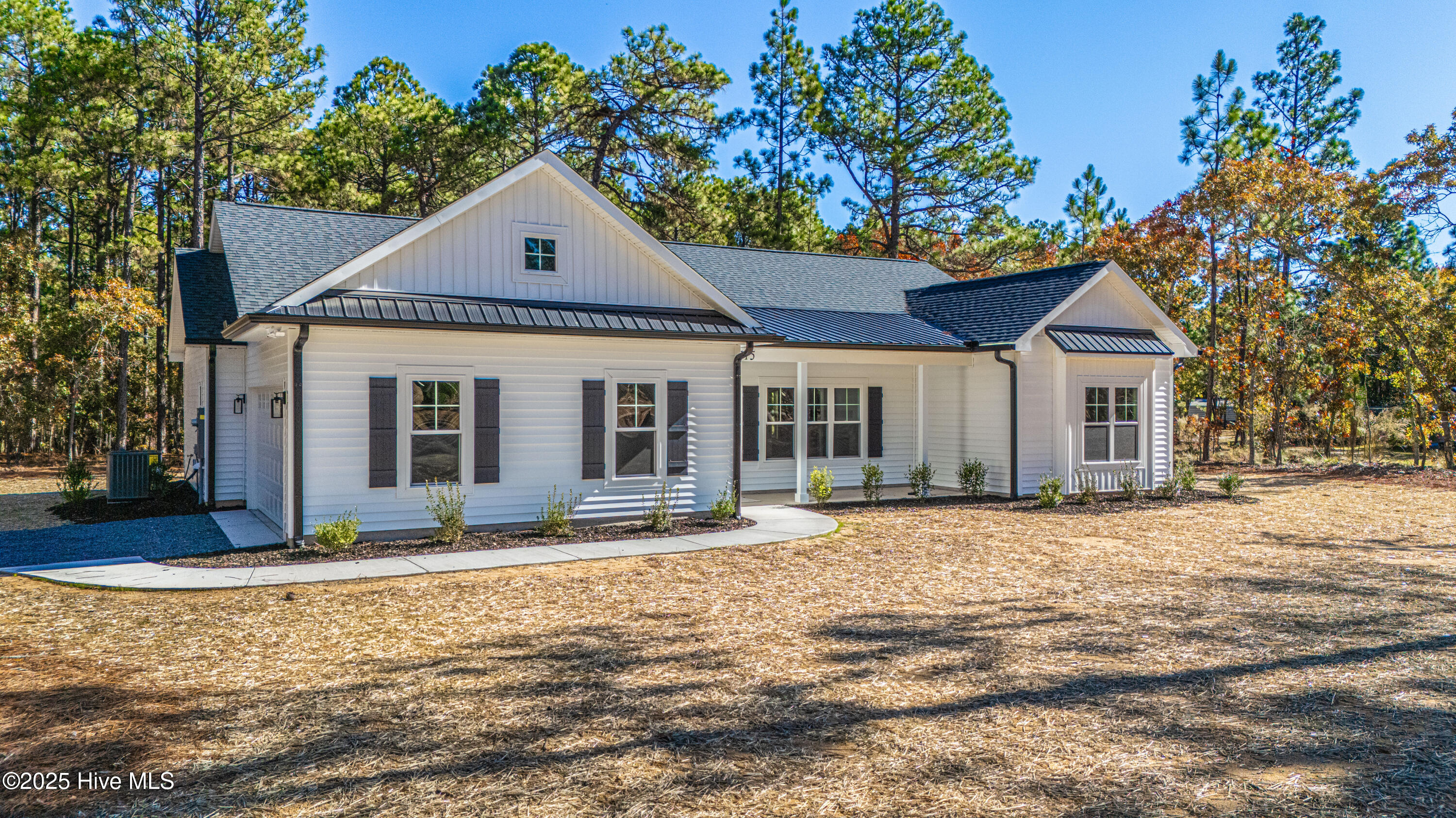115 Sandy Place Pinebluff, NC 28373 - Photo 2 of 42 DJI_20251104110102_0001_D