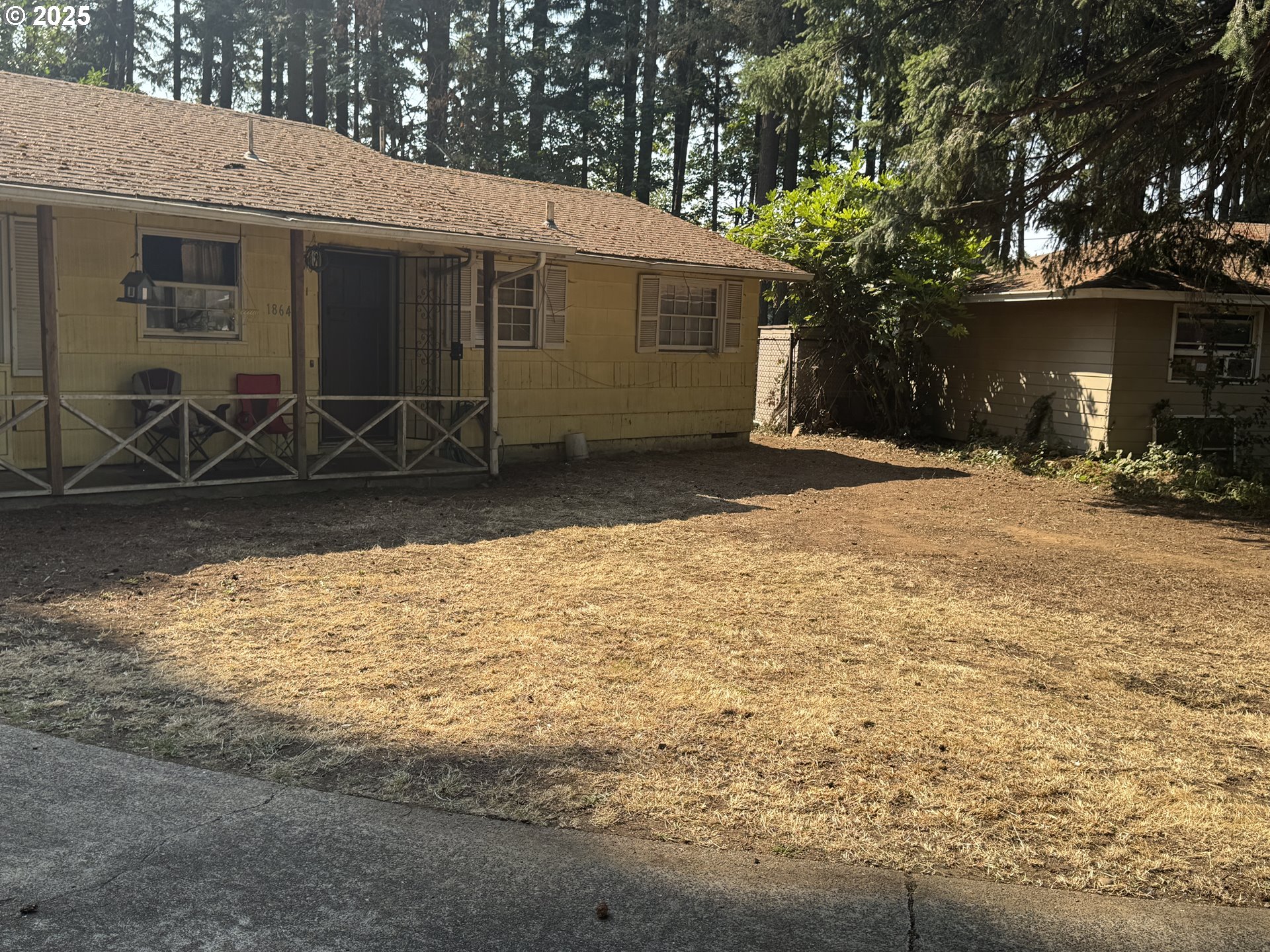 18640 Southeast Yamhill Circle Portland, OR 97233 - Photo 2 of 10 a view of a house with a yard