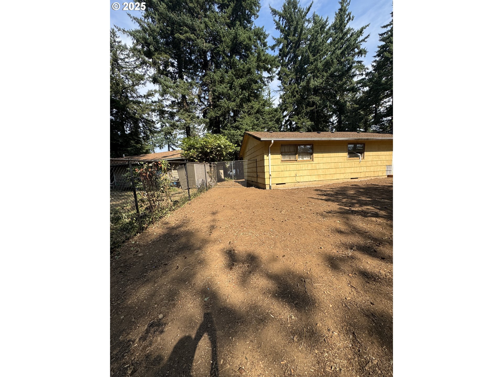 18640 Southeast Yamhill Circle Portland, OR 97233 - Photo 5 of 10 a view of a yard with an outdoor space