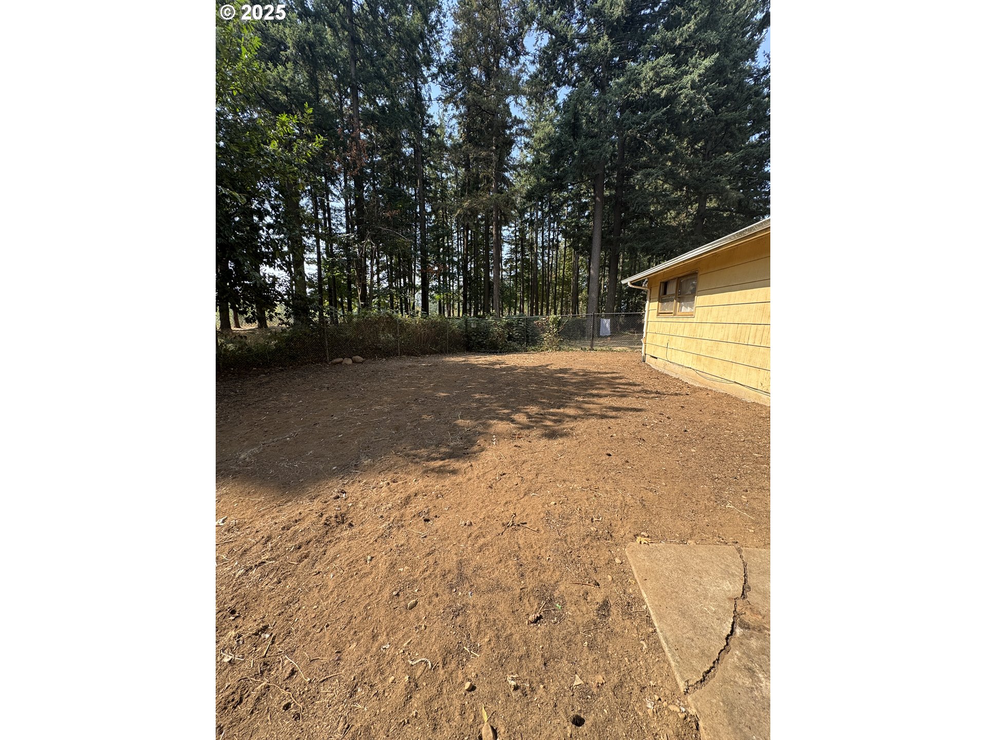 18640 Southeast Yamhill Circle Portland, OR 97233 - Photo 6 of 10 a backyard of a house