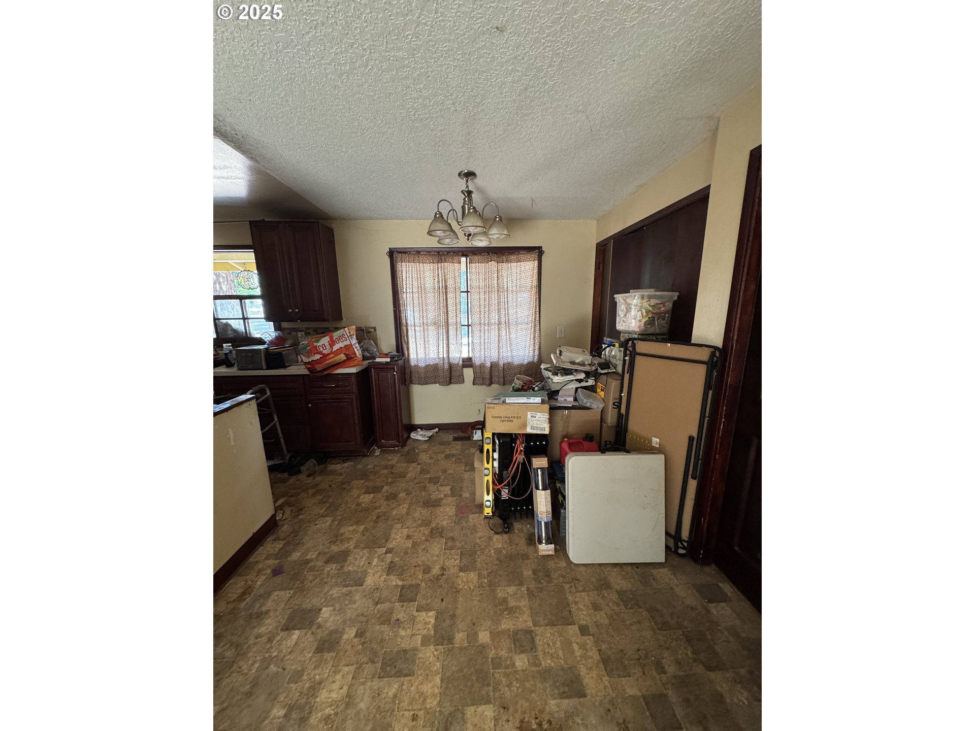 18640 Southeast Yamhill Circle Portland, OR 97233 - Photo 8 of 10 a living room with furniture and a window