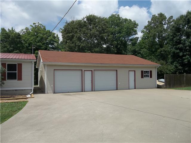 2100 Foster Road Cumberland Furnace, TN 37051 - Photo 3 of 20 Massive 2 car garage with attached office. Ultimate man cave. 32 x 42