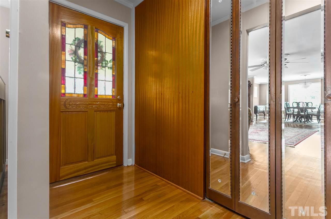 5270 Six Forks Road Raleigh, NC 27609 - Photo 7 of 30 a view of front door with wooden floor