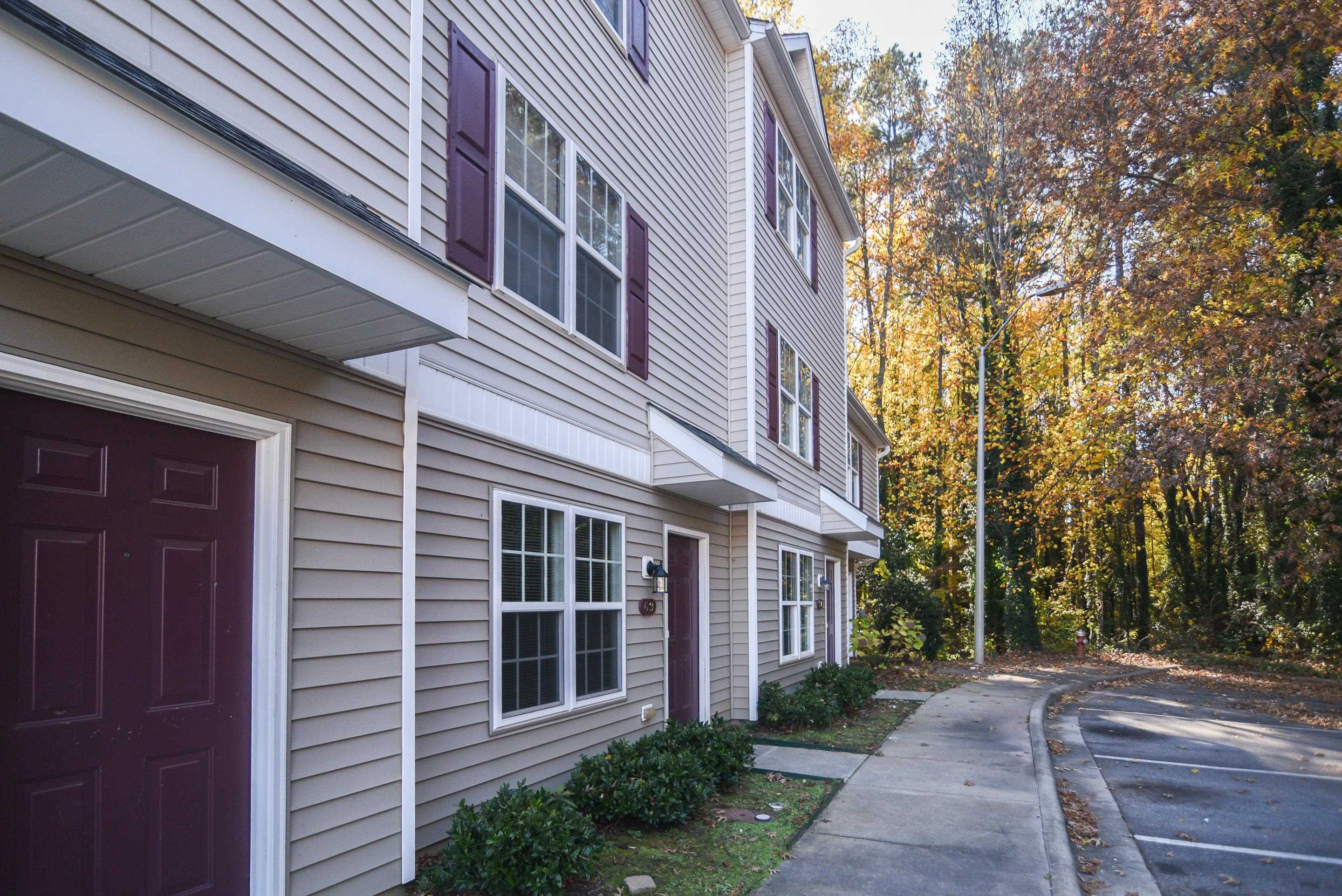 69 Red Lane Raleigh, NC 27606 - Photo 2 of 18 Enjoy the convenience of low-maintenance living! Red Wolf Crossing HOA takes care of the yard work and pest control! Facade/Exterior Front