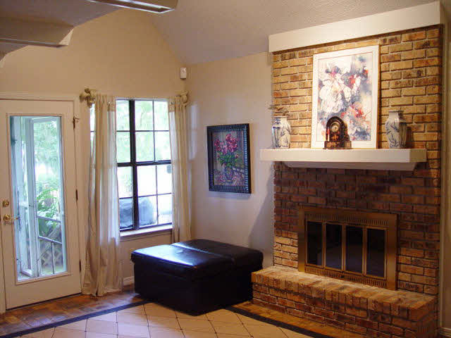 655 North Mobile Street Fairhope, AL 36532 - Photo 6 of 36 Den with fireplace