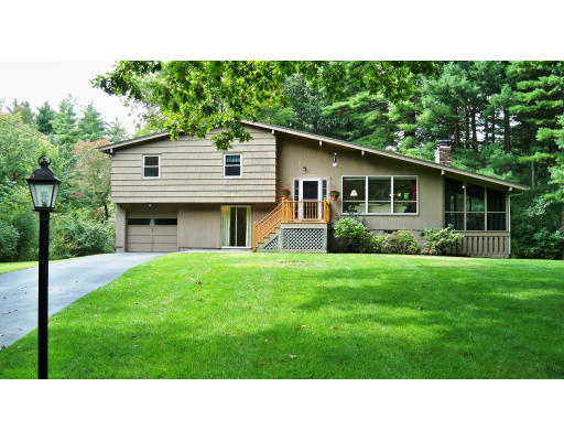 35 Marked Tree Road Sudbury, MA 01776 - Photo 1 of 12 a black and white photo of a house