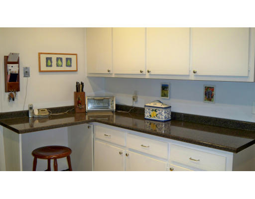 35 Marked Tree Road Sudbury, MA 01776 - Photo 8 of 12 a kitchen with a sink and cabinets