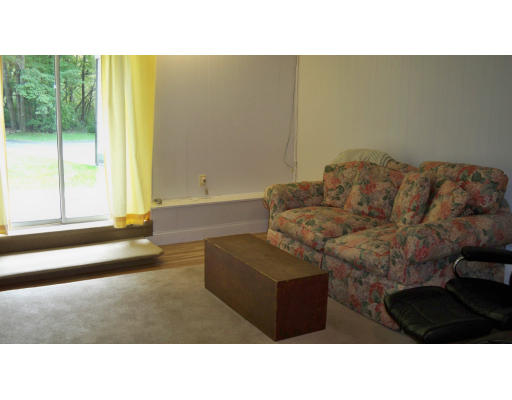 35 Marked Tree Road Sudbury, MA 01776 - Photo 9 of 12 a living room with furniture and a large window