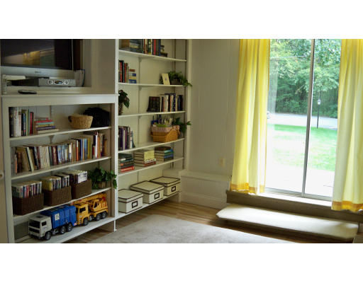 35 Marked Tree Road Sudbury, MA 01776 - Photo 10 of 12 a living room with furniture and a flat screen tv
