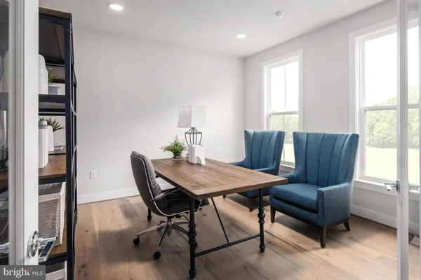 a view of a livingroom with furniture and window
