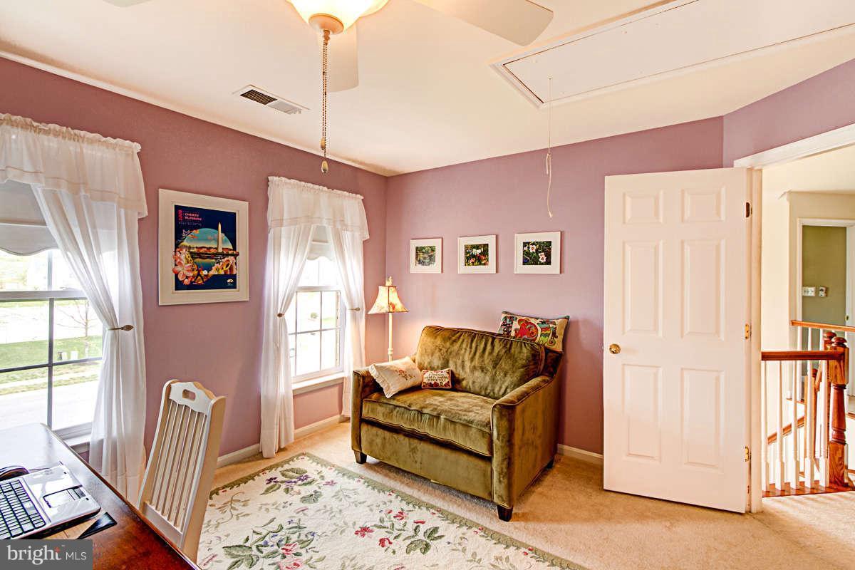 605 Sand Road Severn, MD 21144 - Photo 16 of 30 a living room with furniture and a window