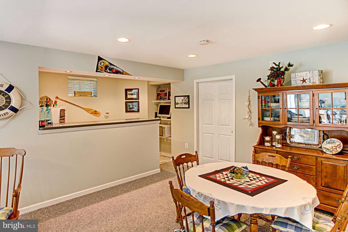 605 Sand Road Severn, MD 21144 - Photo 20 of 30 a view of a dining room with furniture