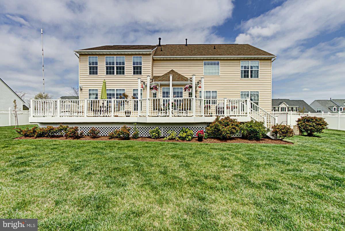 605 Sand Road Severn, MD 21144 - Photo 25 of 30 front view of a house with a yard