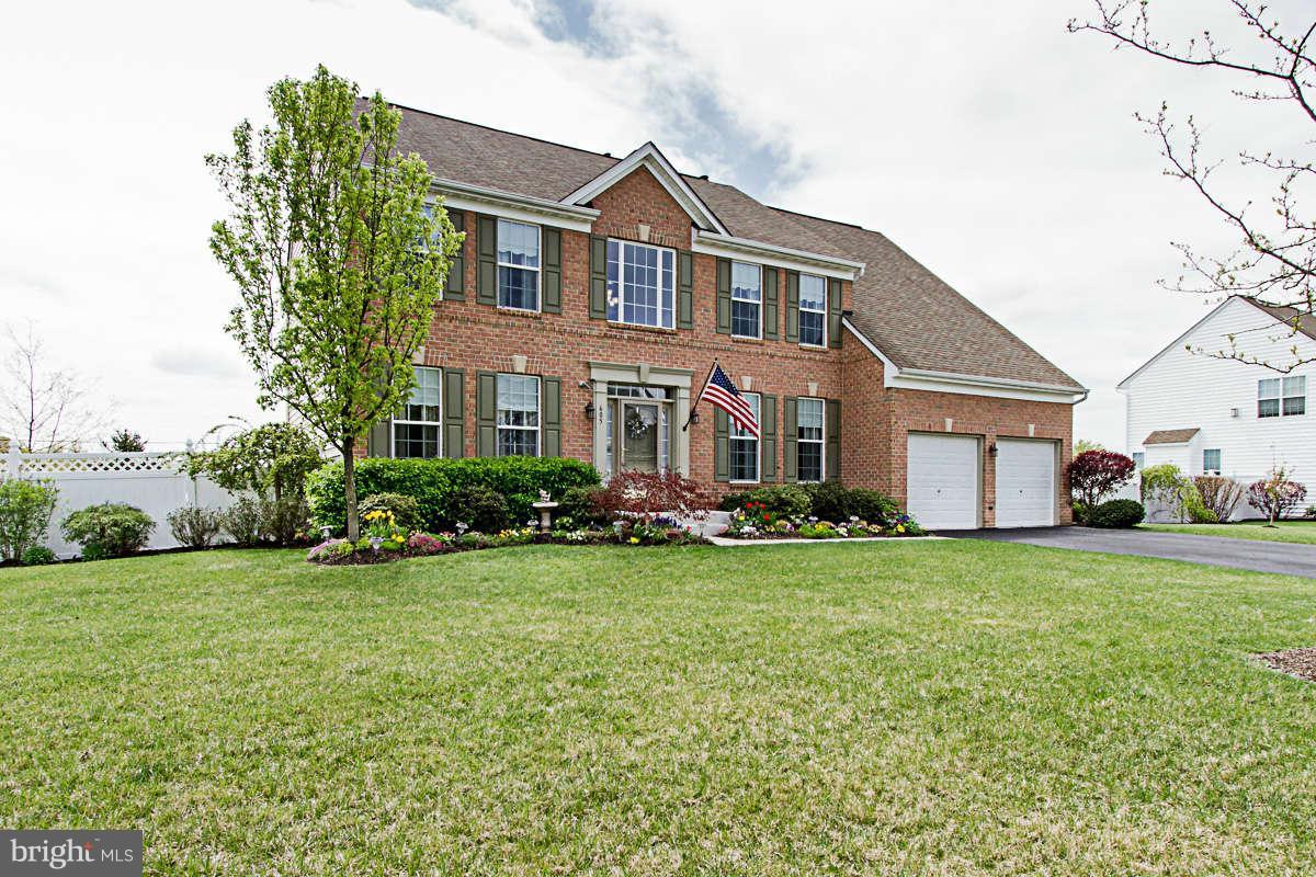 605 Sand Road Severn, MD 21144 - Photo 30 of 30 a front view of a house with swimming pool having outdoor seating