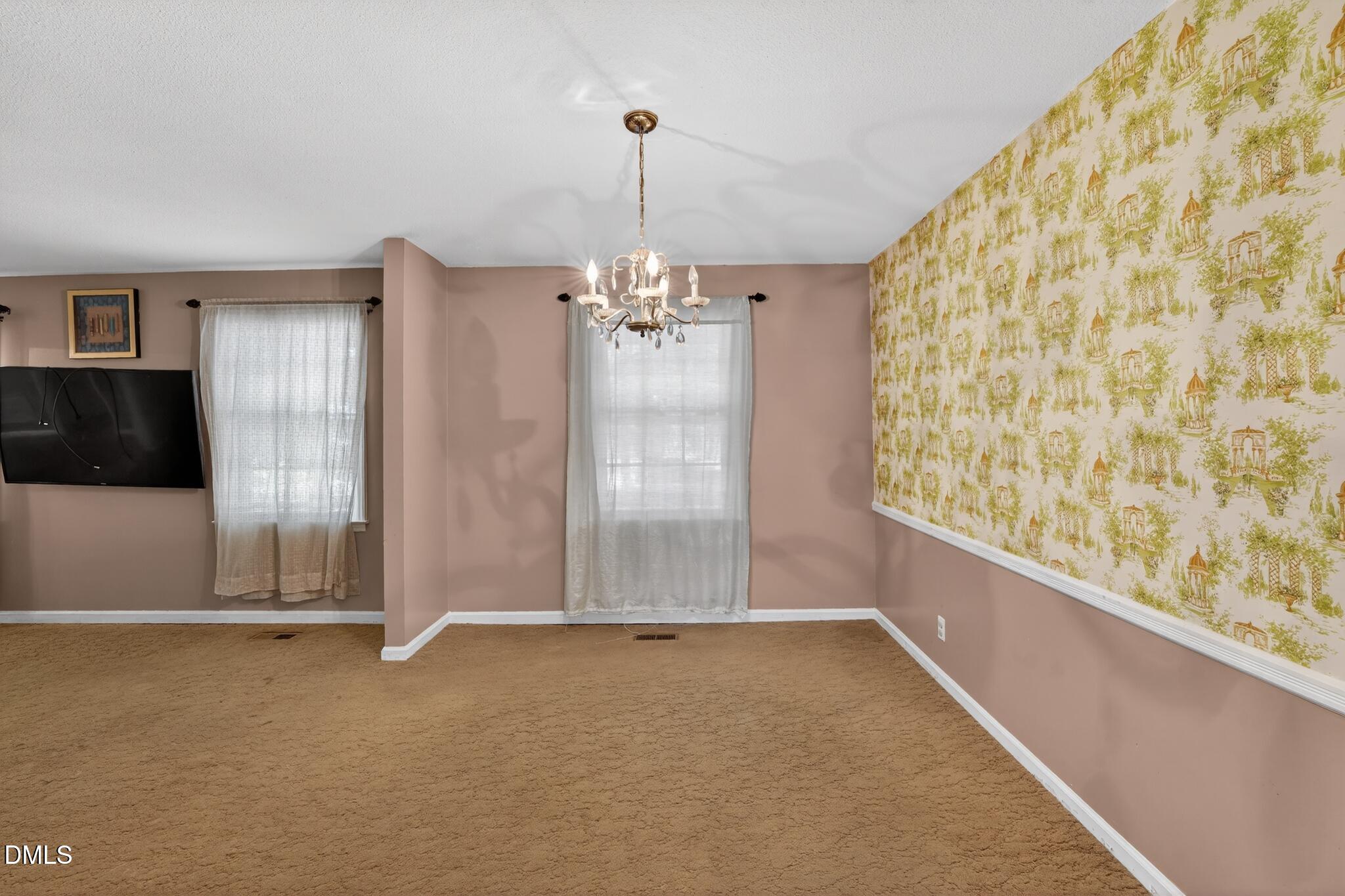 1034 Jerome Road Durham, NC 27713 - Photo 19 of 35 wooden floor in an empty room with a window