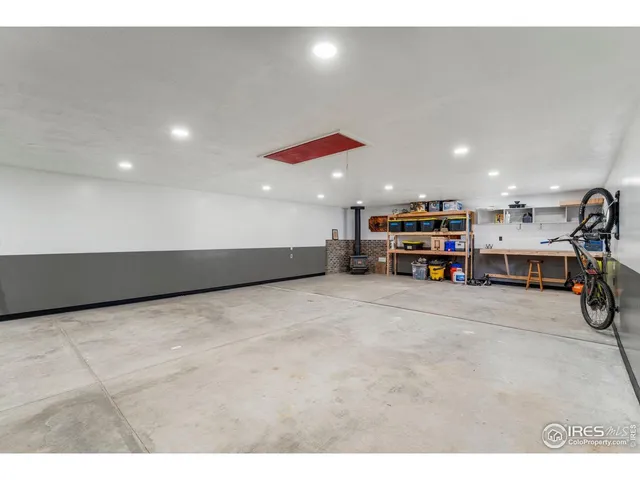 a living room with lots of furniture and a projector