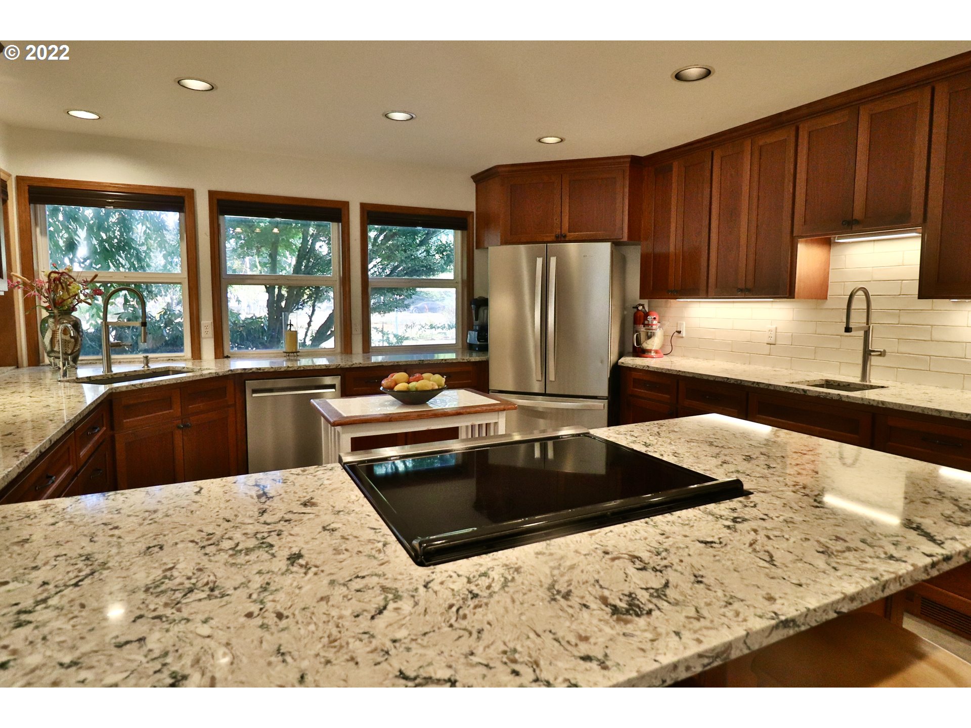 37235 Southeast Lusted Road Boring, OR 97009 - Photo 8 of 30 a kitchen with stainless steel appliances kitchen island granite countertop a sink stove and refrigerator