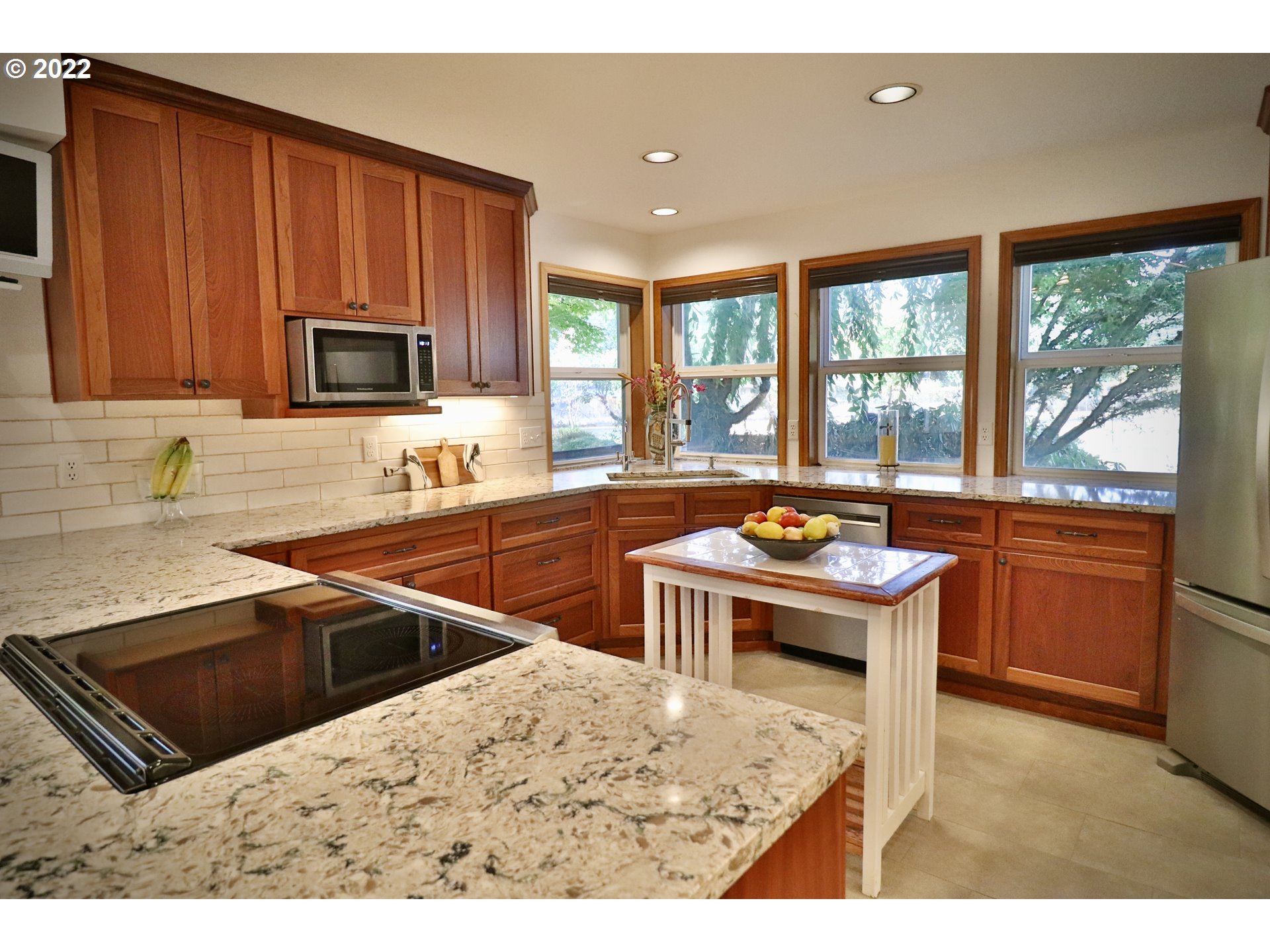 37235 Southeast Lusted Road Boring, OR 97009 - Photo 10 of 30 a kitchen with a stove a sink and a microwave
