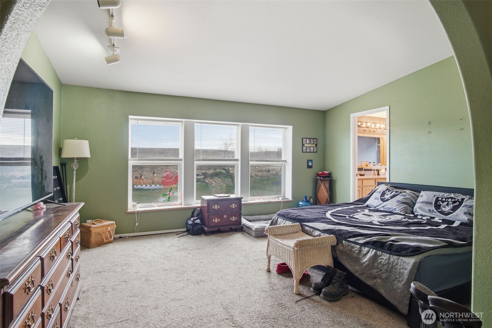 261 Hardy Road Lamont, WA 99017 - Photo 11 of 40 a bedroom with furniture and a window