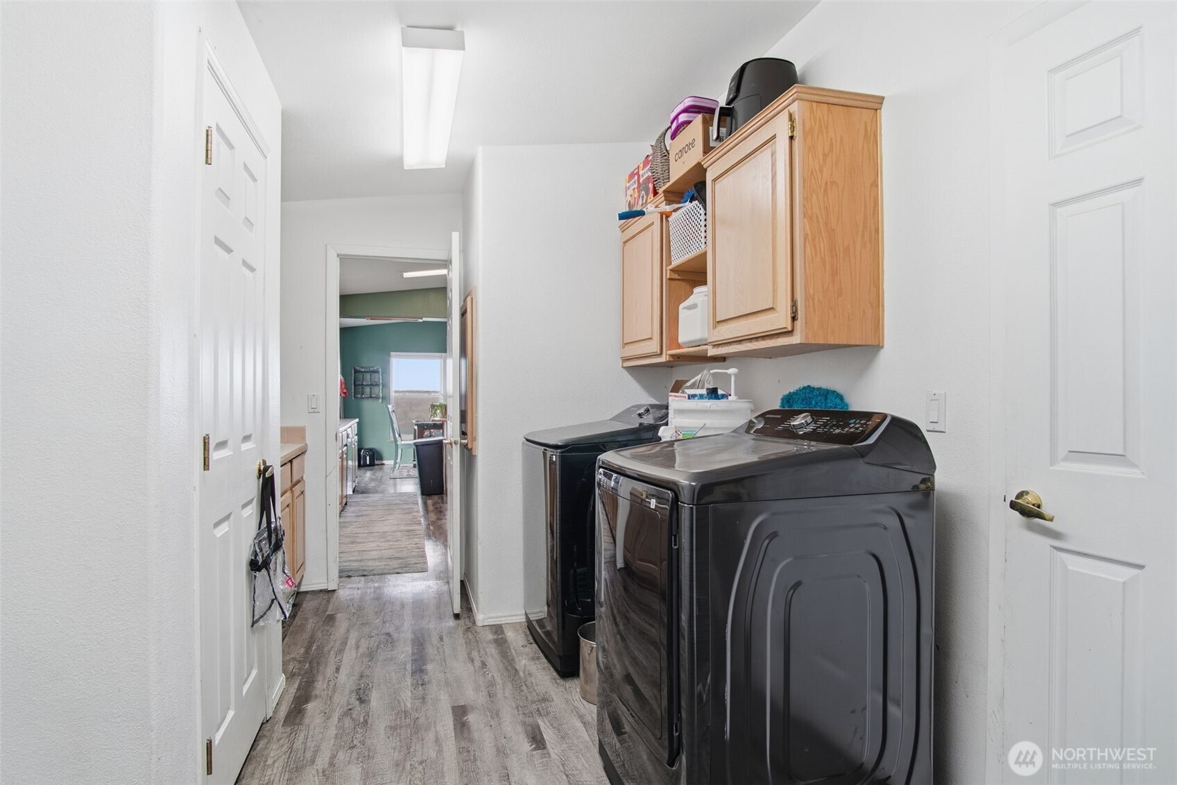 261 Hardy Road Lamont, WA 99017 - Photo 22 of 40 a utility room with dryer and washer
