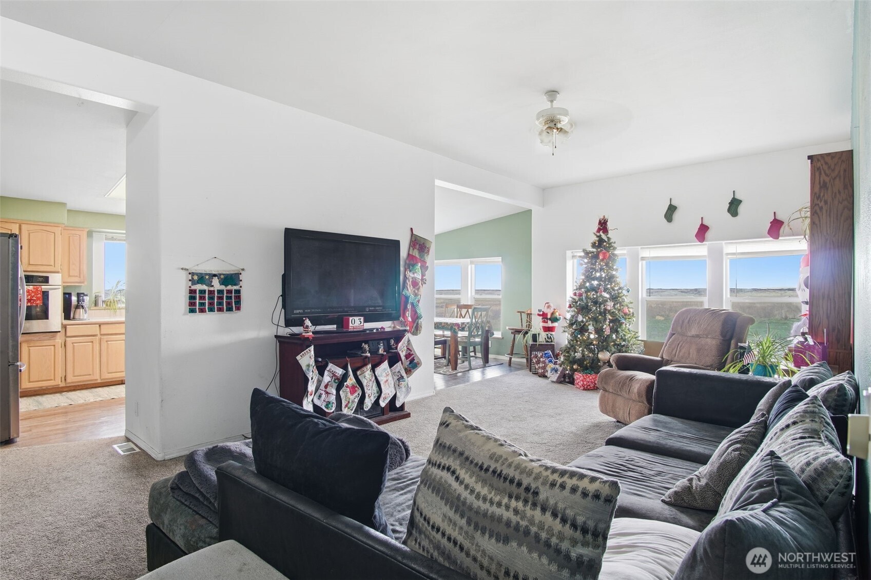 261 Hardy Road Lamont, WA 99017 - Photo 4 of 40 a living room with furniture and a flat screen tv