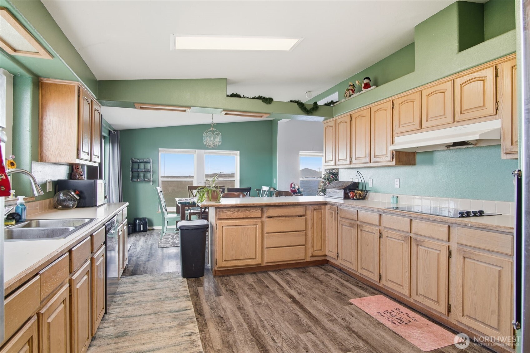 261 Hardy Road Lamont, WA 99017 - Photo 5 of 40 a kitchen with cabinets oven and a sink