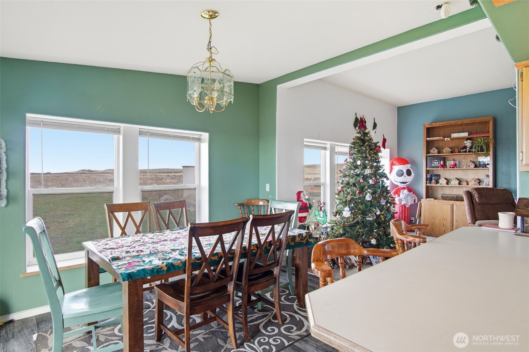 261 Hardy Road Lamont, WA 99017 - Photo 8 of 40 a view of a dining room with furniture window and outside view