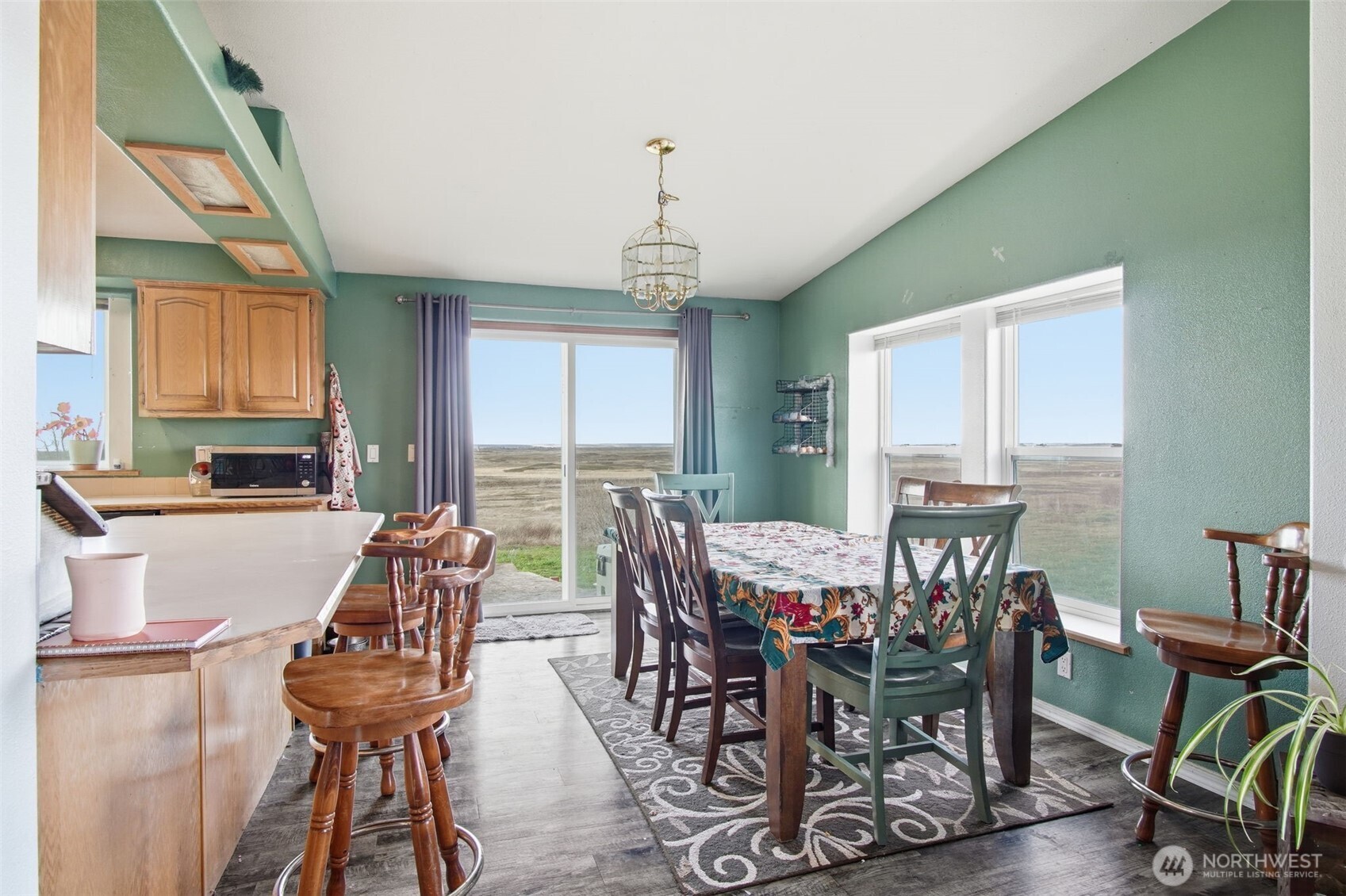 261 Hardy Road Lamont, WA 99017 - Photo 9 of 40 a view of a dining room with furniture window and outside view