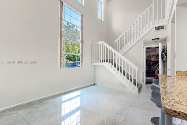 a view of an entryway with staircase
