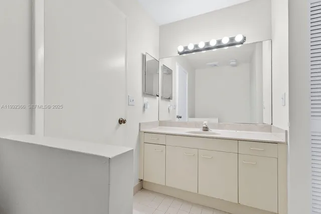 a view of a small space with wooden floor