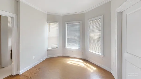 an empty room with window