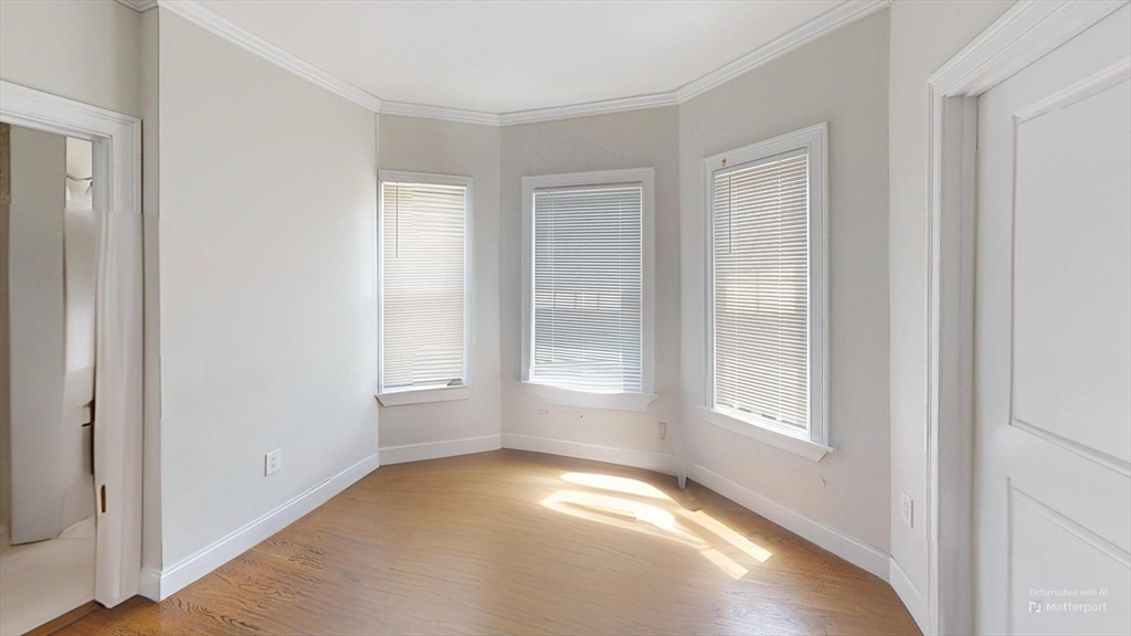 2975 Washington Street, Unit 3 Boston, MA 02119 - Photo 4 of 9 a view of empty room with window