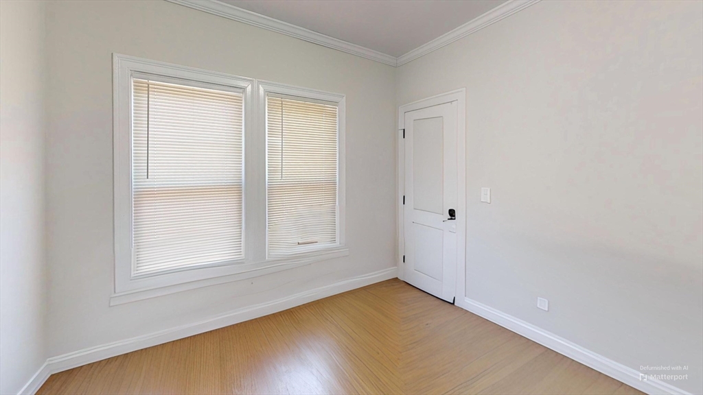 2975 Washington Street, Unit 3 Boston, MA 02119 - Photo 5 of 9 an empty room with window