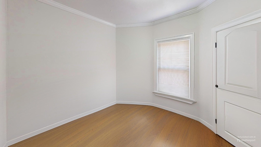 2975 Washington Street, Unit 3 Boston, MA 02119 - Photo 7 of 9 an empty room with a window