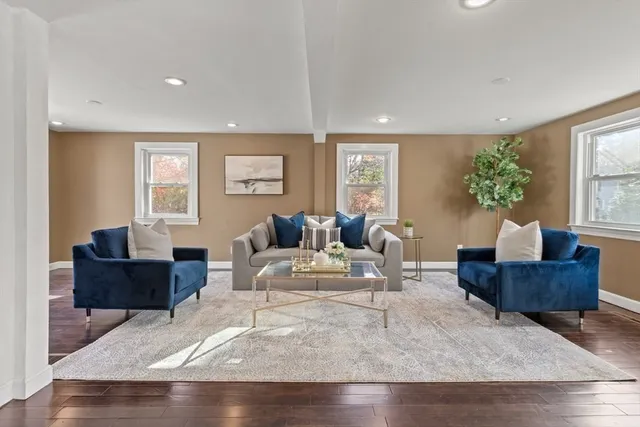 a living room with furniture and a couch