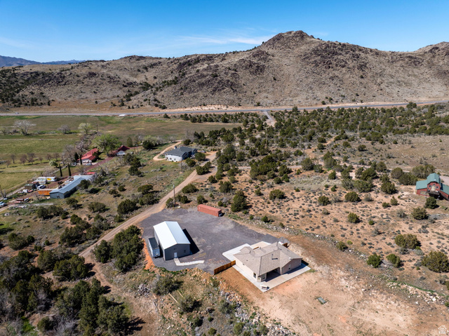 62 North Lucky 7 Road Veyo, UT 84782 - Photo 41 of 43 Aerial view of sparsely populated area featuring a desert landscape and mountains