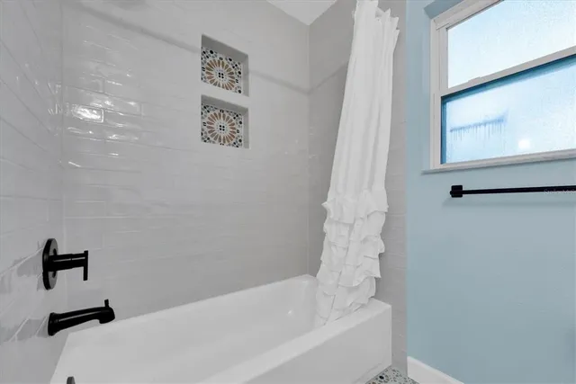 a bathroom with a bathtub