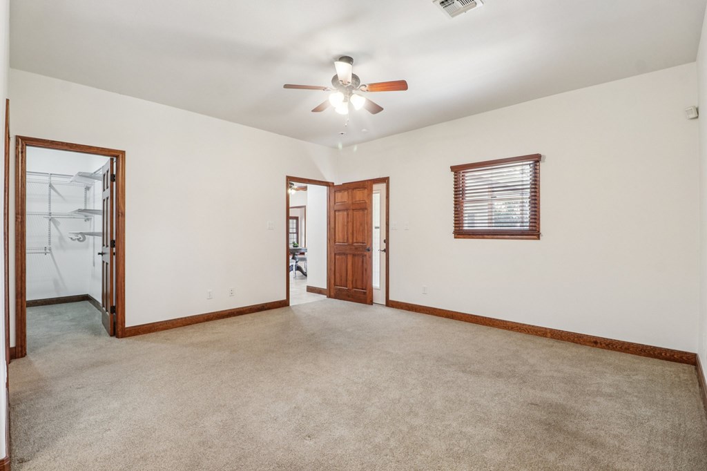 802 Ave C Fredericksburg, TX 78624 - Photo 15 of 22 a view of an empty room with a window
