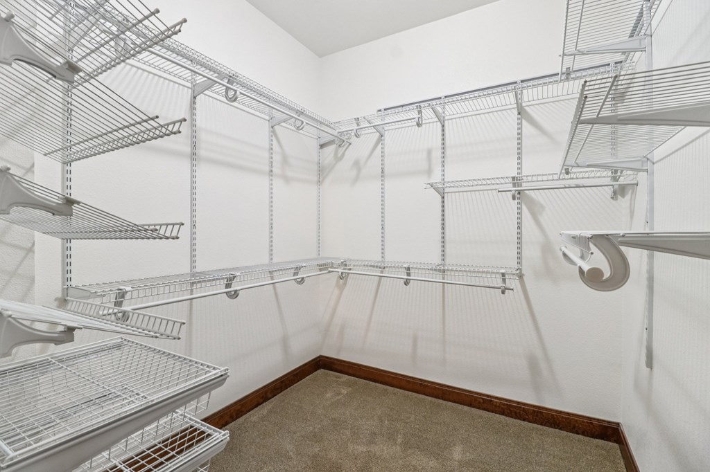 802 Ave C Fredericksburg, TX 78624 - Photo 16 of 22 a view of a room with racks on the wall