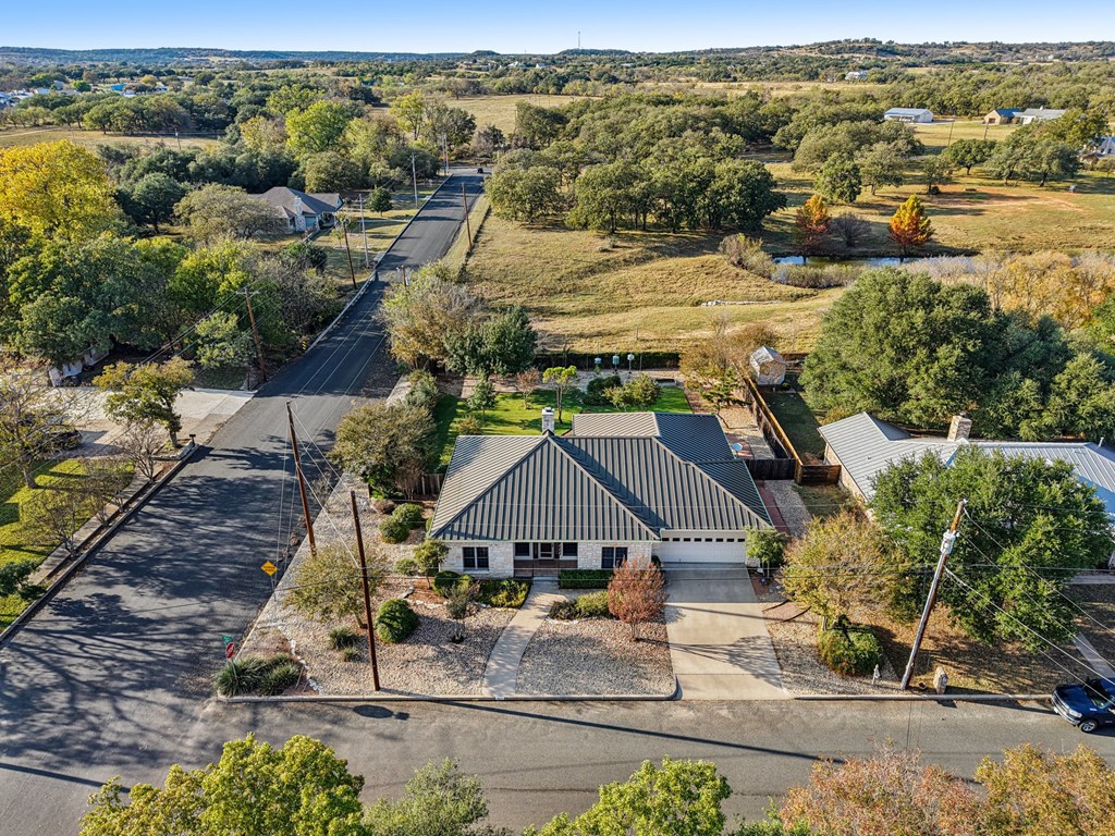 802 Ave C Fredericksburg, TX 78624 - Photo 3 of 22 an aerial view of residential houses with outdoor space and street view
